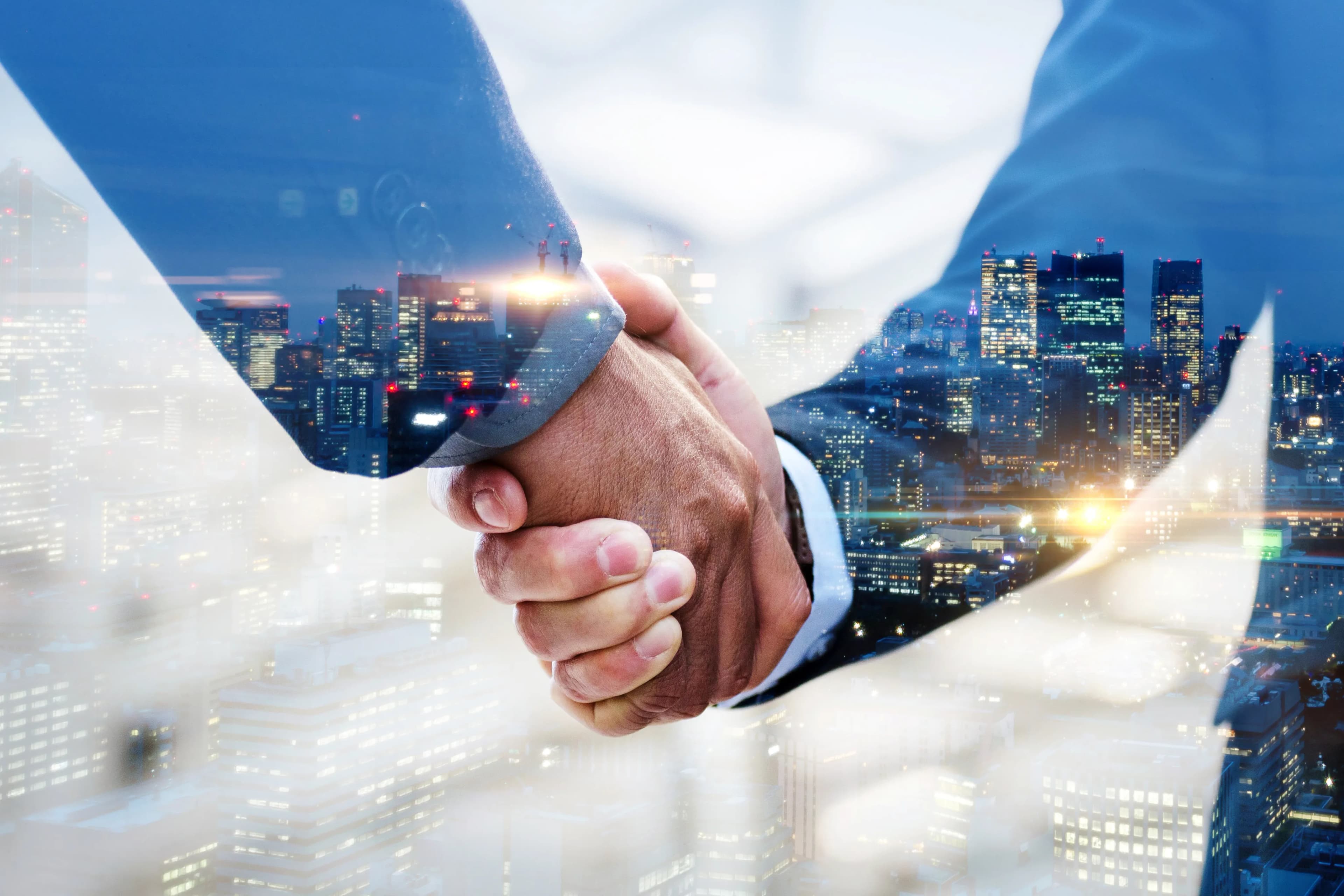 Business partners shaking hands